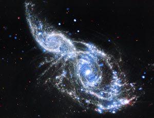 Telescop James Webb - Vue de NGC 2207 and IC 2163: A Pair of Galactic Cornucopia